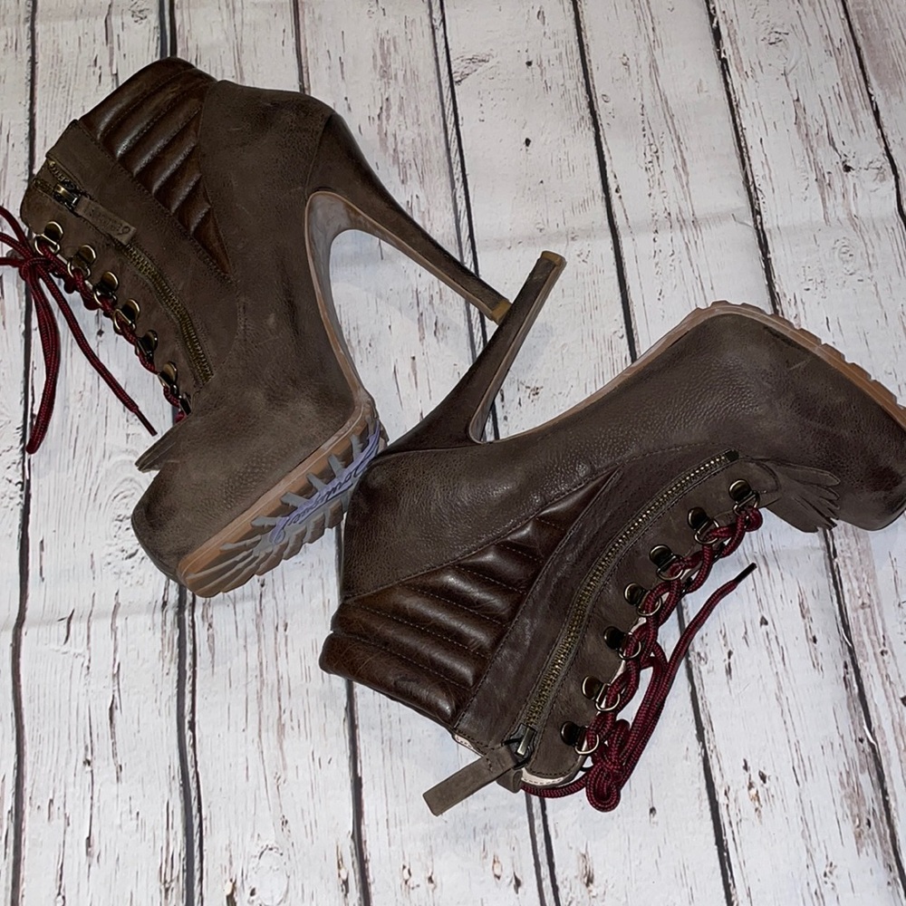 Boutique 9  lace up high heel bootie .
